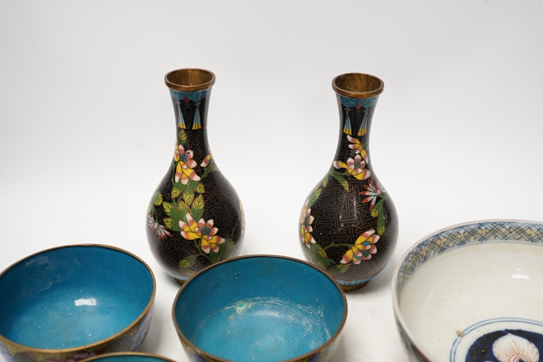 A Japanese Arita bowl and a quantity of Japanese and Chinese cloisonné enamel wares, tallest 17cm. Condition - fair